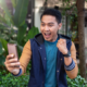 This image captures a guy who looks thrilled while looking at his phone—maybe he just got some exciting news or a positive message. It’s a moment full of joy and confidence. When thinking about "what is the right mindset for dating," this image reflects exactly that—being upbeat, open to new possibilities, and celebrating small wins. In dating, having a positive and confident mindset can make all the difference, just like this guy is showing with his reaction!