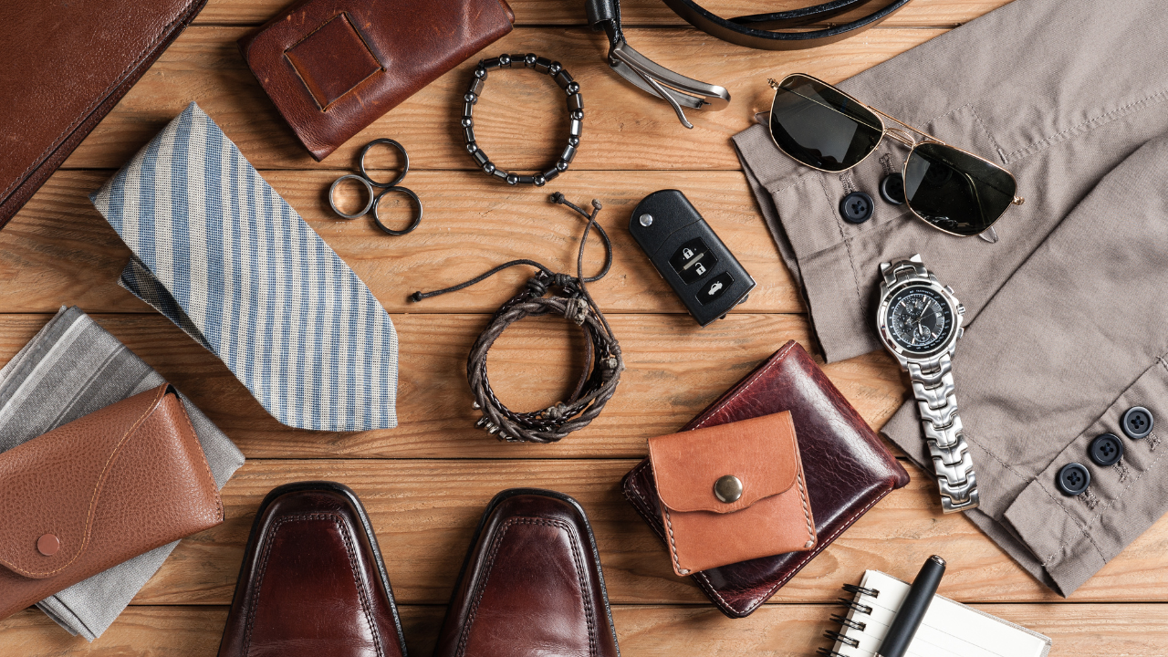 This photo highlights essential men’s accessories and outfit elements that align perfectly with dress to impress codes. Featuring polished shoes, a sleek watch, sunglasses, and a crisp tie, it emphasizes the importance of attention to detail when curating a standout look. These items reflect how combining key accessories can elevate your style for formal or casual settings, helping you make a confident and lasting impression.