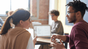 Person navigating a conversation with confidence – how to handle small talk with ease.