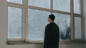 introvert dating struggles &ndash; representing the quiet emotional distance and hesitation introverts feel when trying to build romantic connections.